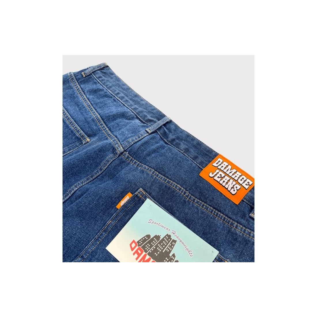 DAMAGE ORANGE TAB JEANS AZUL