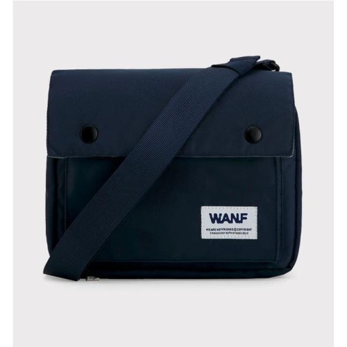 WE ARE NOT FRIENDS CROSS BAG AZUL CLARO