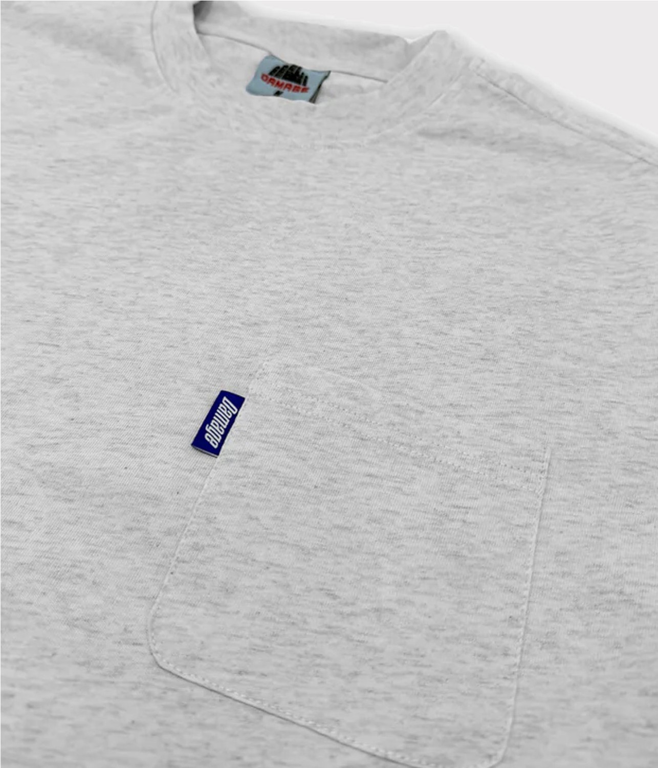 DAMAGE POCKET TEE